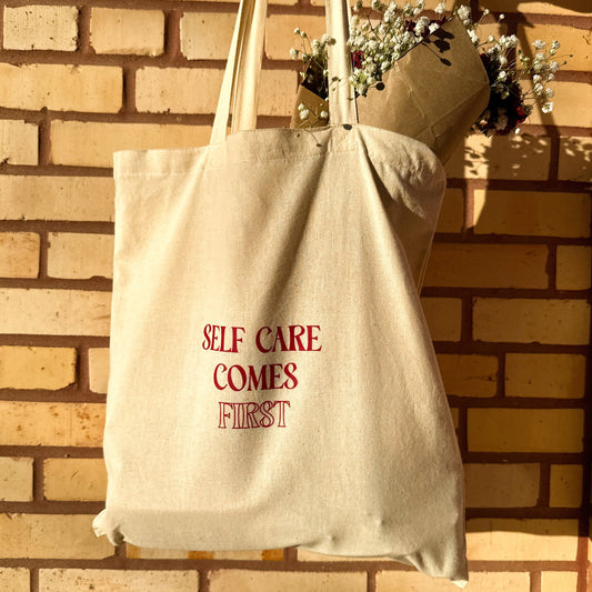 Self care comes first tote bag
